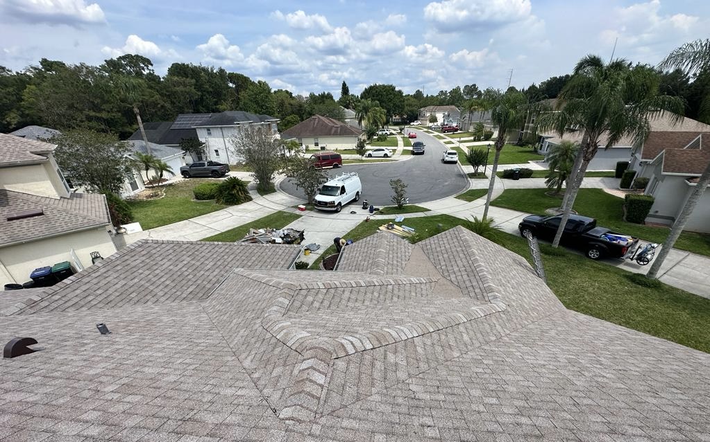 Assure-U Roofing crew installing a new roof on a Central Florida home