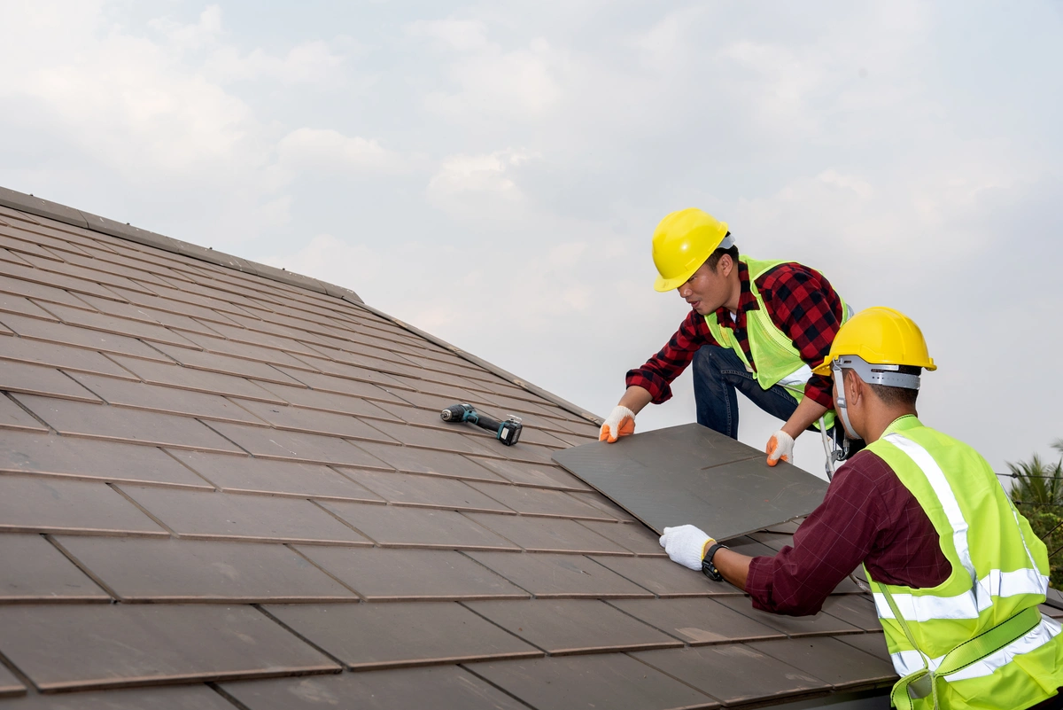 Assure-U Roofing crew performing tile roof maintenance in Orlando, FL