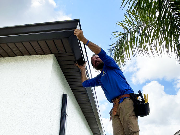 Seamless gutter installation on a Florida home by Assure-U Roofing