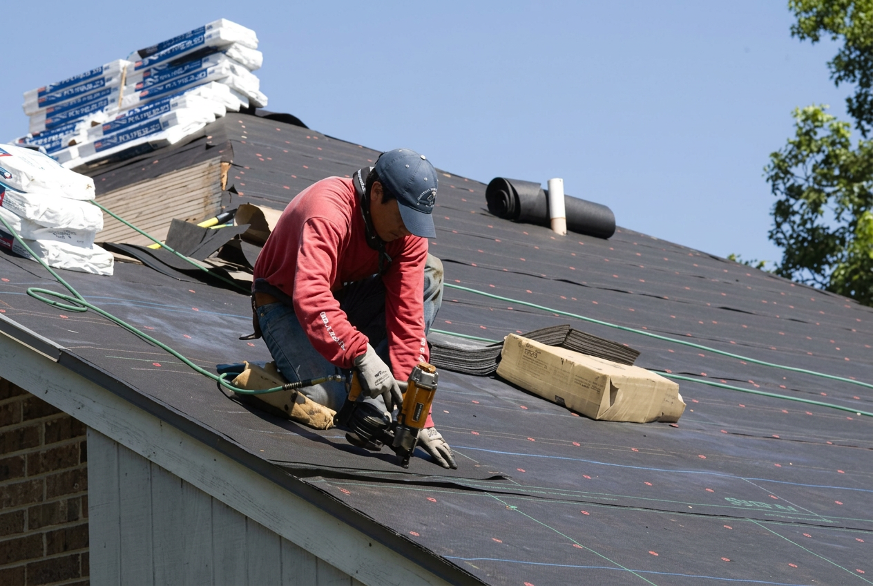 Assure-U Roofing crew completing a roofing project in Windermere, FL