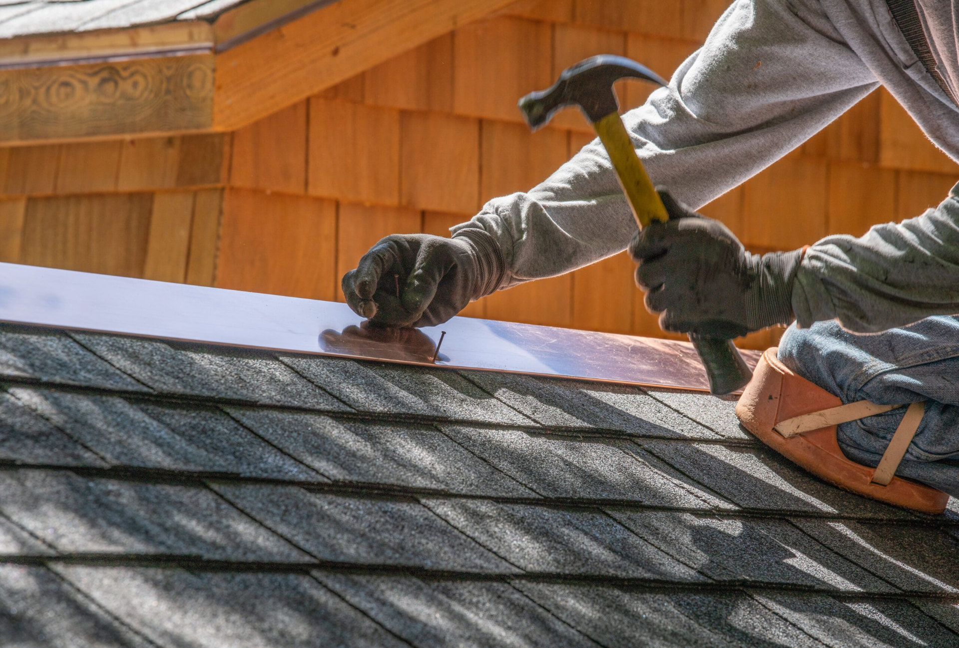 Assure-U Roofing crew completing a roofing project in Kissimmee, FL