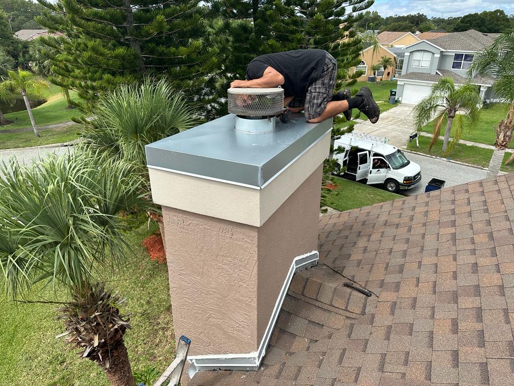 Chimney flashing repair completed on an Orlando, FL shingle roof