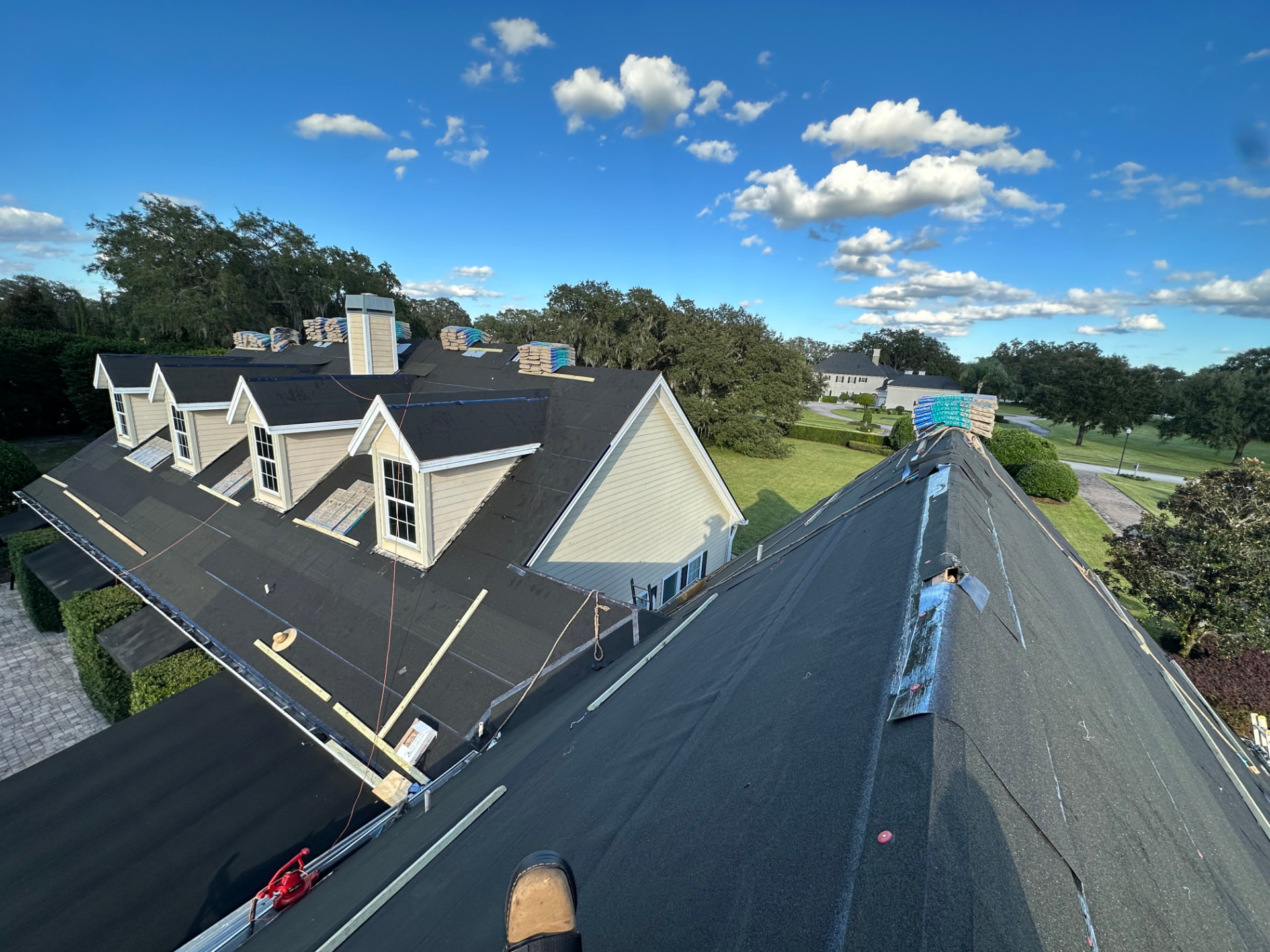 Assure-U Roofing in-house crew working on a Central Florida roof replacement