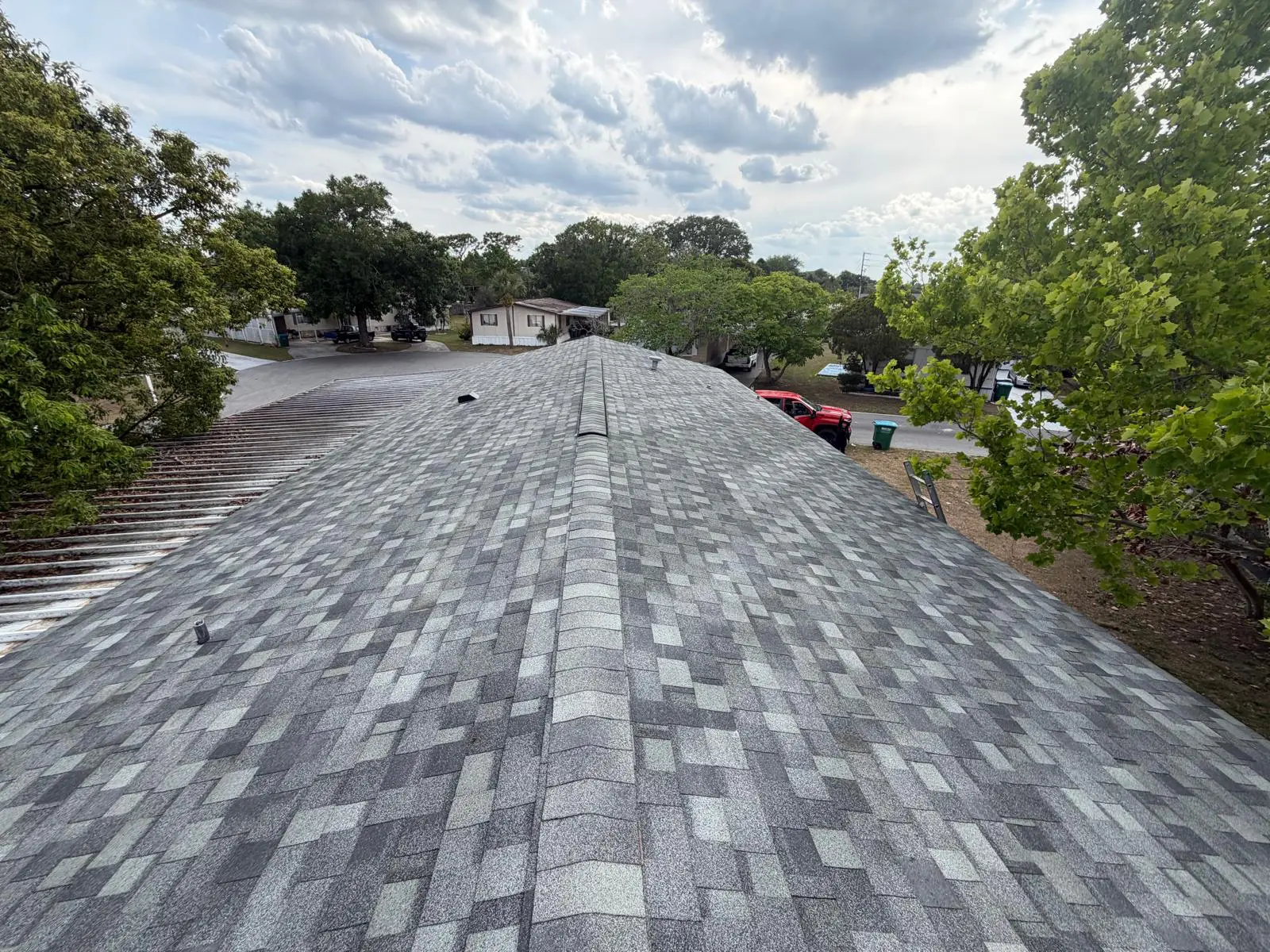 New shingle roof and gutter line completed on an Orlando, FL home
